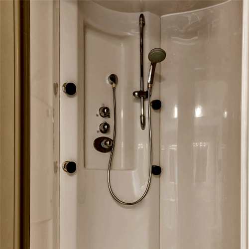 shower-with-a-shower-head-in-a-shower-door-blaby