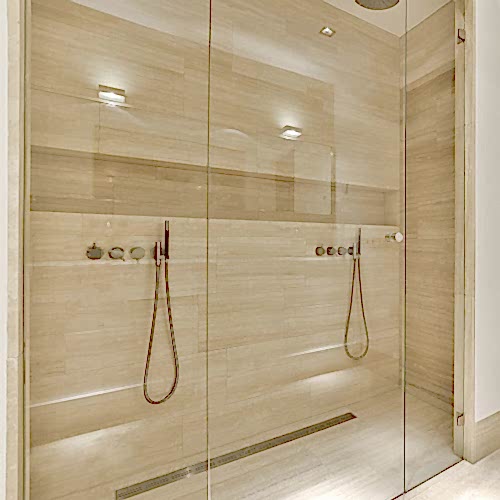 bathroom-with-a-shower-and-a-wooden-door-fleckney