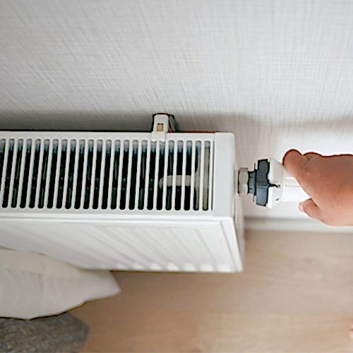 hand-controls-thermostatic-knob-of-heating-radiator-Broughton Astley